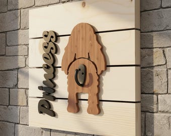 May include: Wooden dog leash hanger with a dog silhouette and the name "Princess". The hanger has a metal hook and is mounted on a light-colored wooden board. The text "DOG LEASH HANGER HOOK TEMPLATES" is at the top.