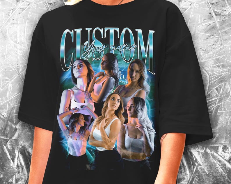 May include: Black oversized t-shirt with a graphic print of five women with the text "CUSTOM Your name" in a blue and silver font.