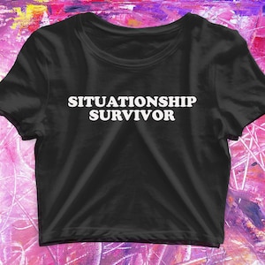 May include: Black crop top with white text that reads "Situationship Survivor".