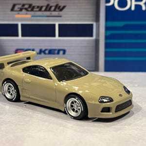 Hot Wheels Custom sand Toyota Supra mk4 with Real Rider wheel swap 1/64 scale