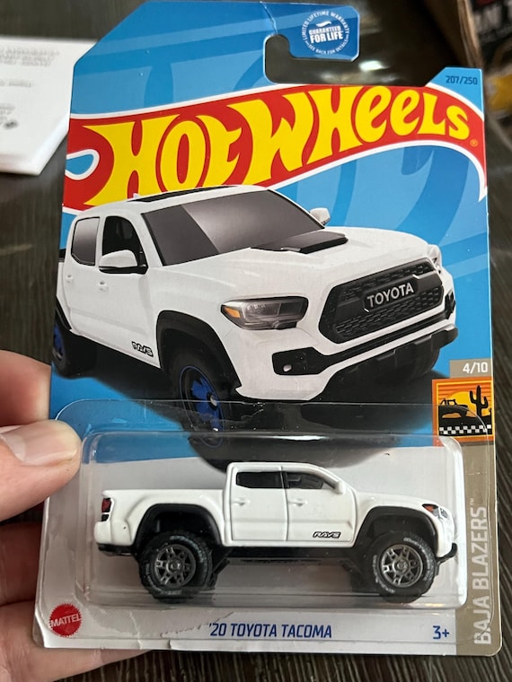 Hot Wheels 1:64 Scale Toyota Tacoma 3rd Gen White With TRD Custom
