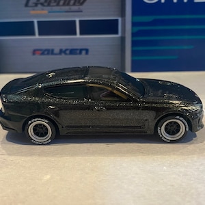 Hot wheels Kia stinger GT Black with Custom Real Riders a Choice of Wheels damaged card
