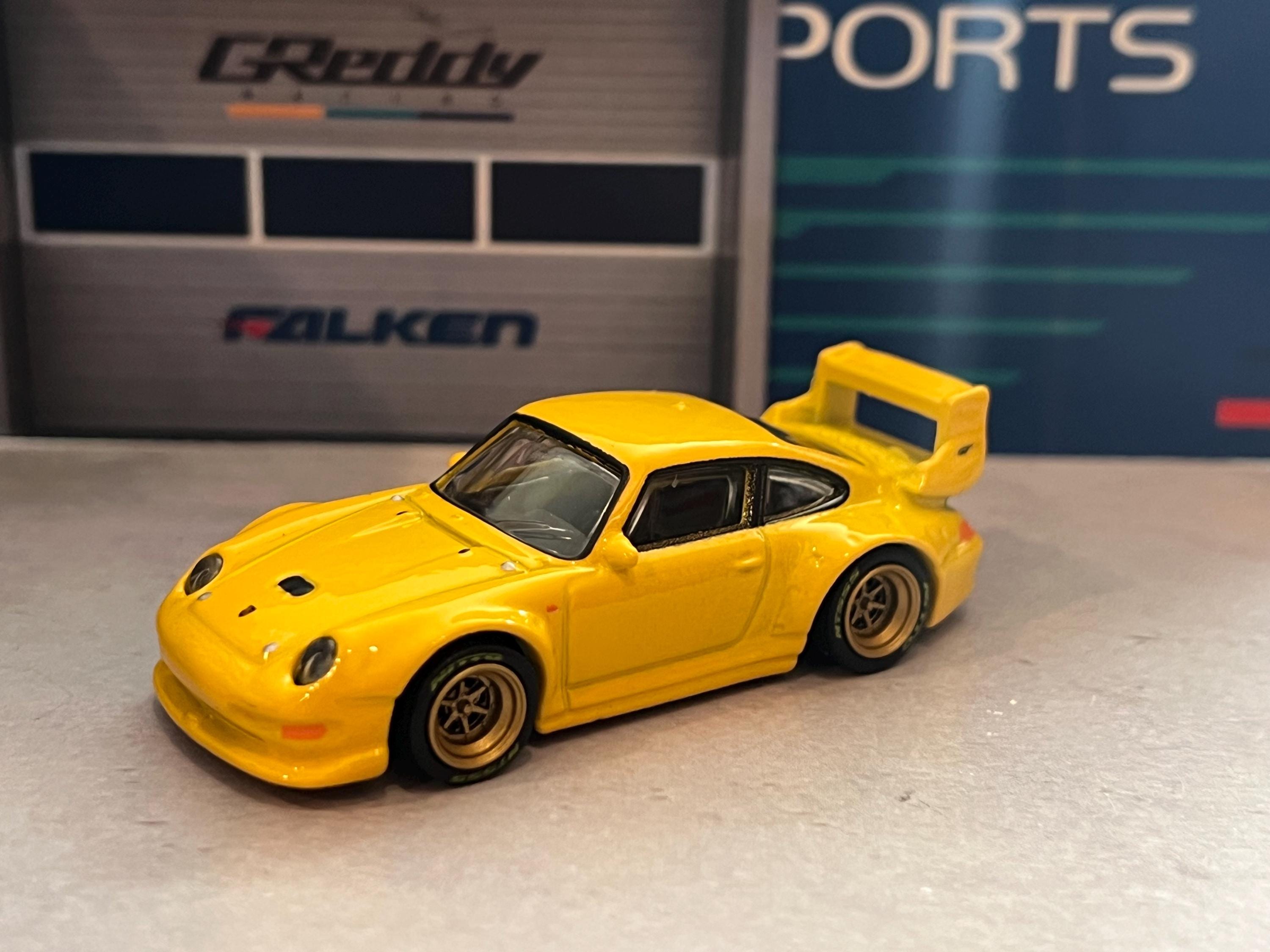 Hot Wheels Porsche Premium 911 GT2 Yellow With Real Rider Wheel