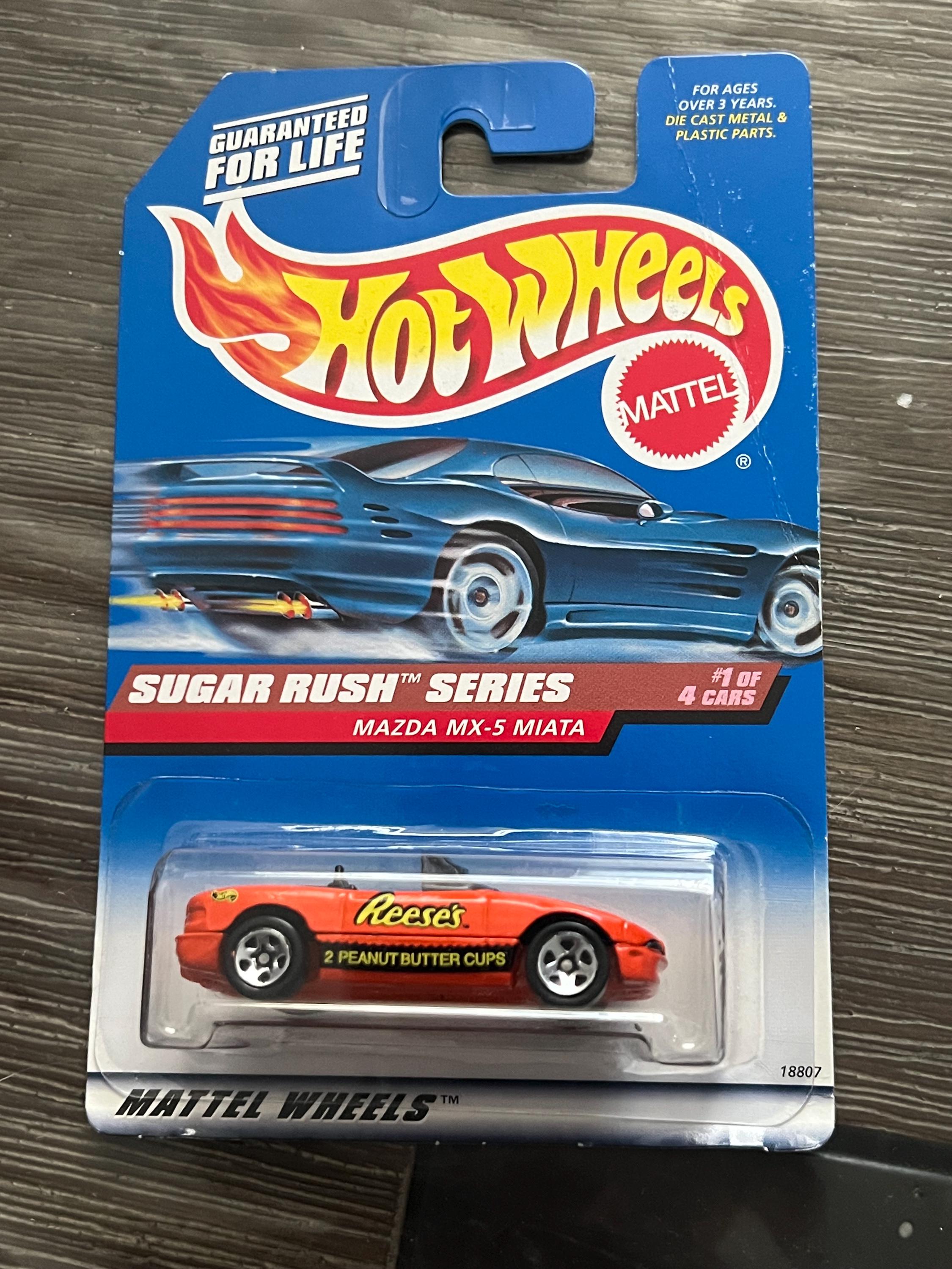 Hot Wheels Vintage Mazda Miata Reese's Edition. New Sealed Damaged