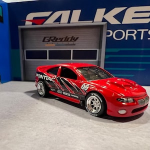 Hot wheels 06 Pontiac GTO with real rider swap. Choose wheel