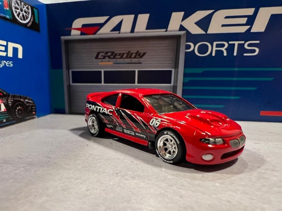 ホットウィール ポンティアックGTO フレイムス リアルライダー Hot Wheels 06 Pontiac GTO With Real Rider Swap. Choose Wheel