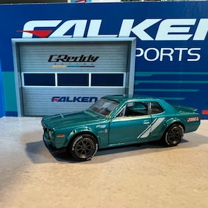 Hot wheels Nissan skyline HT 2000gtx teal with real rider swap