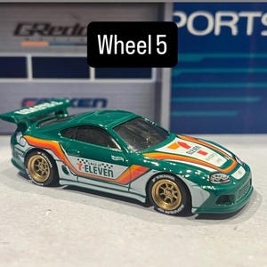 Hot Wheels 7-Eleven Toyota Supra wheel swapped 1/64 scale  jdm car toy