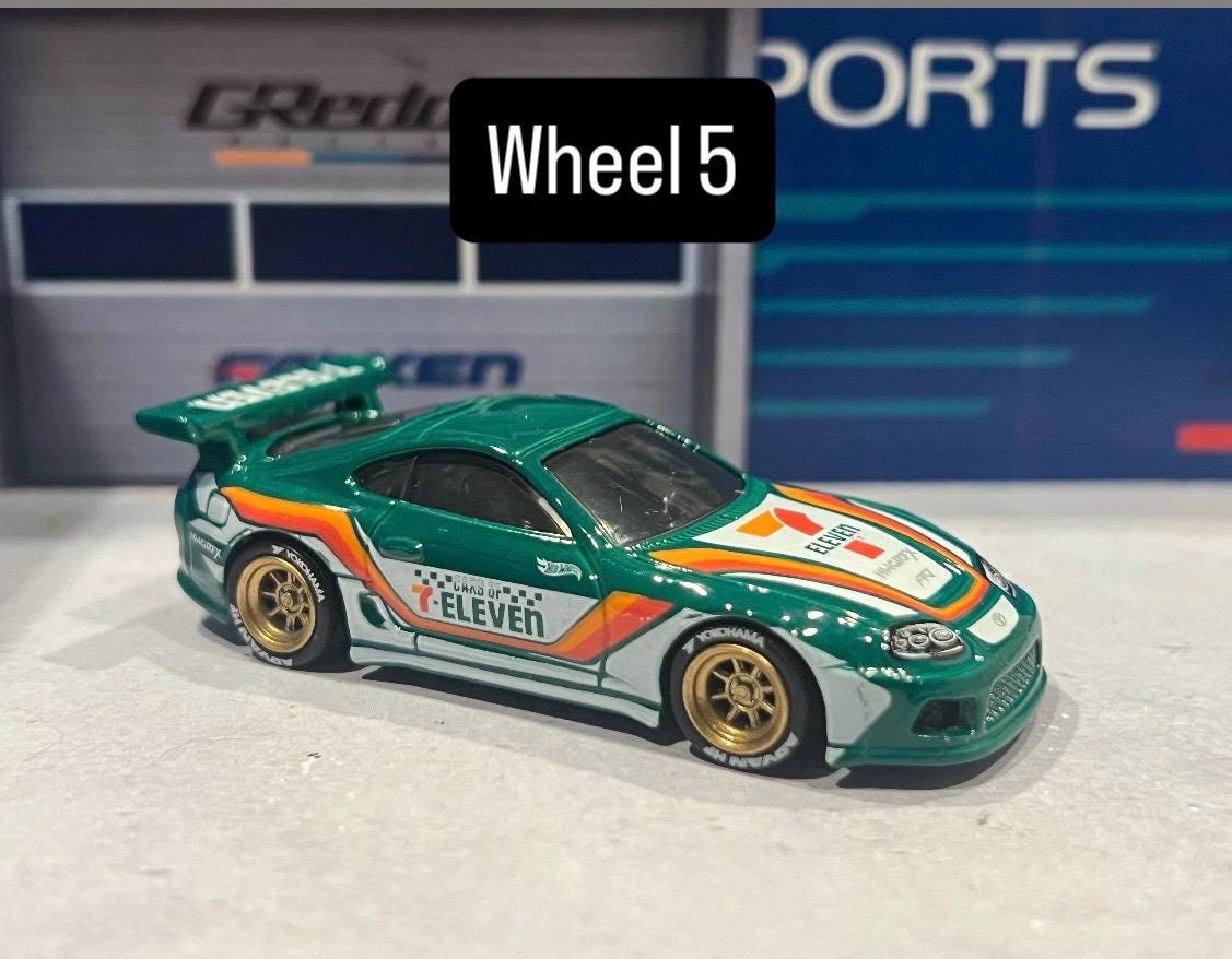 モ*ト様 Hot Wheels 7-Eleven Toyota Supra s-l400.jpg