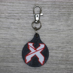 Excision Keychain – Bass Music Rave Gift, Festival Accessory, EDM Basshead Merch