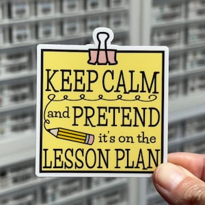 May include: A set of three ceramic mugs with a speckled, matte finish. The mugs are in shades of cream, light brown, and dark brown. Each mug has a simple, minimalist design, perfect for coffee or tea.