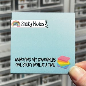May include: A light blue square sticky note featuring the text "The Perky Pencil Sticky Notes" at the top and the black text "ANNOYING MY COWORKERS ONE STICKY NOTE AT A TIME" at the bottom, accompanied by a small graphic of a colorful stack of sticky notes.