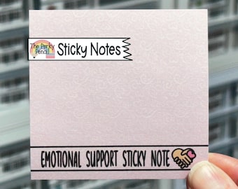 May include: A square light pink sticky note featuring a subtle embossed swirl pattern. The top left corner displays a logo with the text The Perky Pencil Sticky Notes. The bottom section contains the text EMOTIONAL SUPPORT STICKY NOTE with a small icon of two hands holding a pink heart.