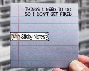 May include: A square sticky note with blue horizontal lines and a red vertical line on the left side. The text "THINGS I NEED TO DO SO I DON'T GET FIRED" is printed in black. The sticky note also has the text "Sticky Notes" and a logo.