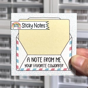 May include: A square sticky note featuring an illustration of an open envelope with a pale yellow interior. The envelope edges have a red and blue striped pattern. The text reads: A NOTE FROM ME YOUR FAVORITE COWORKER and The Perky Pencil Sticky Notes.
