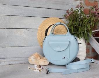 Round women's leather bag of blue color. Crossbody bag. Blue leather bag. Women bag. round bag. Handbag zippers.