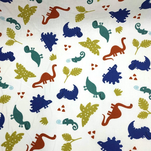 Tissu au mètre coton motif dinosaures colorés