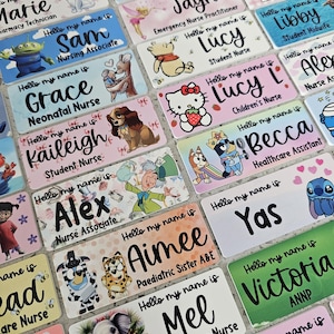 May include: A collection of rectangular name badges featuring various cartoon characters and professional titles. Each badge displays the text Hello my name is followed by a personalized name and job role, printed in a mix of script and sans-serif fonts.