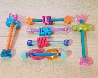 Juguetes de pájaros con forma de piruleta, palitos de cuentas de colores (juego de 4)