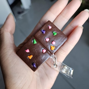 Cosmic Brownie Badge Reel - Sweet and Stylish ID Holder