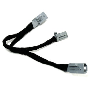 May include: A black wire with two gray connectors on each end. The wire is about 12 inches long.