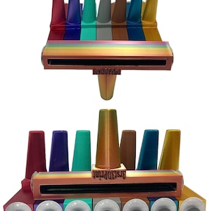 May include: A display of 3D-printed items in a range of colours, including red, blue, green, and gold. The design features cone-shaped elements and rectangular bases. The text "3rst3Dprint" is printed on the objects.