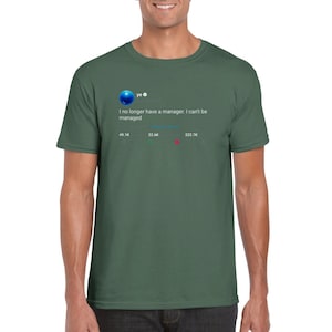 May include: A green t-shirt featuring a tweet from Kanye West. The tweet reads "I no longer have a manager. I can't be managed." The tweet has 49.1K likes, 22.6K retweets, and 222.7K comments.