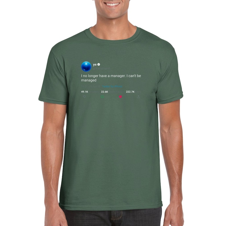 May include: A green t-shirt featuring a tweet from Kanye West. The tweet reads "I no longer have a manager. I can't be managed." The tweet has 49.1K likes, 22.6K retweets, and 222.7K comments.