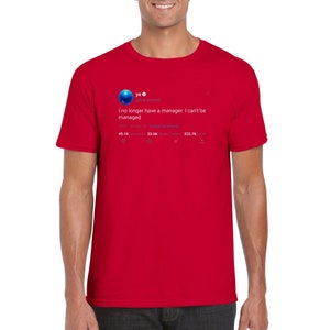 May include: Red t-shirt featuring a screen printed image of a tweet from Kanye West's Twitter account. The tweet reads: "I no longer have a manager. I can't be managed."