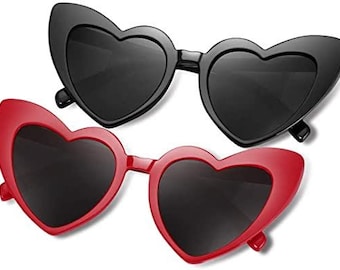May include: Two pairs of heart-shaped sunglasses, one black and one red.