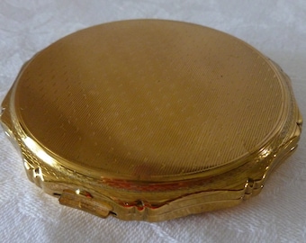 Polvos compactos dorados Vintage Kigu