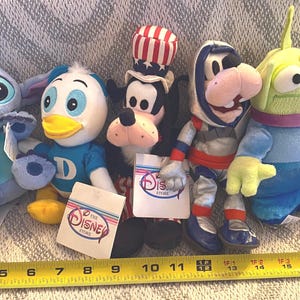 Vintage Disney Plush Collection: Flounder, Pooh, Goofy, Alien, Stitch, Dewey image 2
