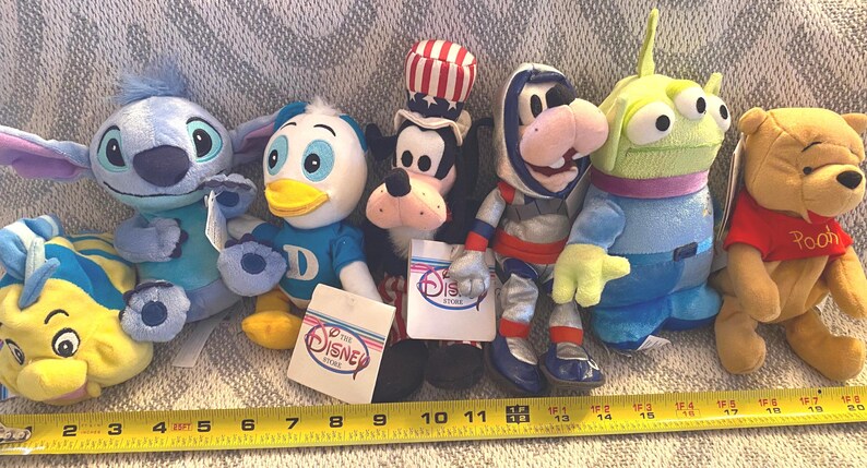 Vintage Disney Plush Collection: Flounder, Pooh, Goofy, Alien, Stitch, Dewey image 2