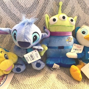 Vintage Disney Plush Collection: Flounder, Pooh, Goofy, Alien, Stitch, Dewey image 9
