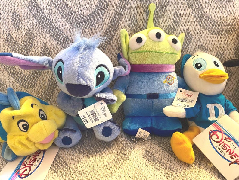 Vintage Disney Plush Collection: Flounder, Pooh, Goofy, Alien, Stitch, Dewey image 9