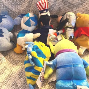 Vintage Disney Plush Collection: Flounder, Pooh, Goofy, Alien, Stitch, Dewey image 7