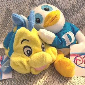 Vintage Disney Plush Collection: Flounder, Pooh, Goofy, Alien, Stitch, Dewey image 6