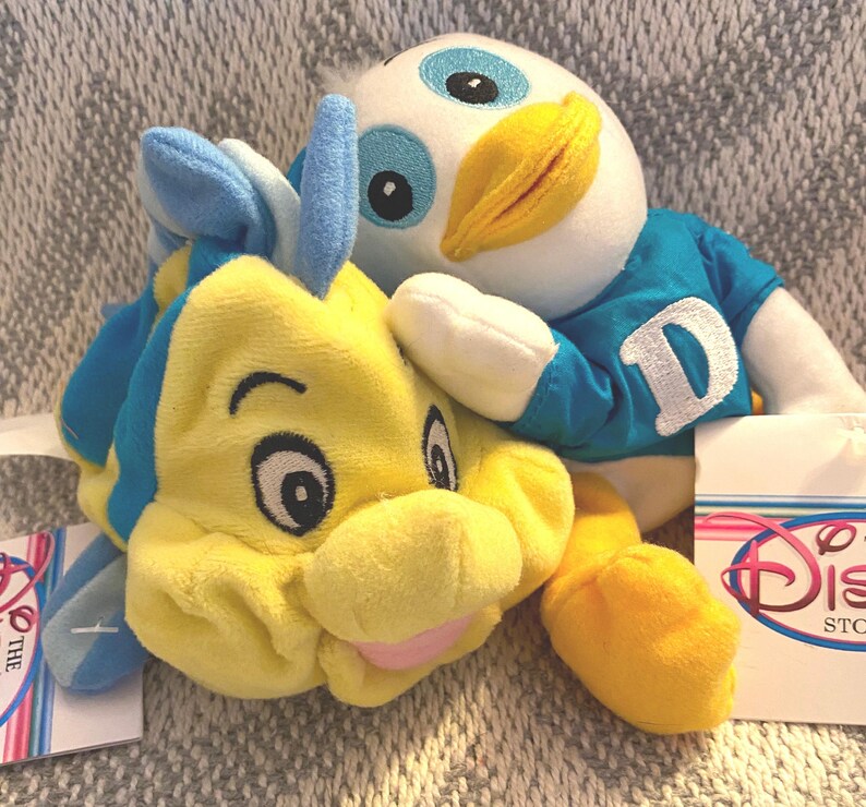 Vintage Disney Plush Collection: Flounder, Pooh, Goofy, Alien, Stitch, Dewey image 6