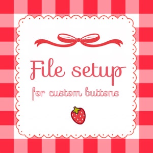 May include: A white square with rounded corners and a scalloped border, on a red and white gingham background. The square has a red bow at the top, the text "File setup for custom buttons" in red, and a red strawberry illustration at the bottom.