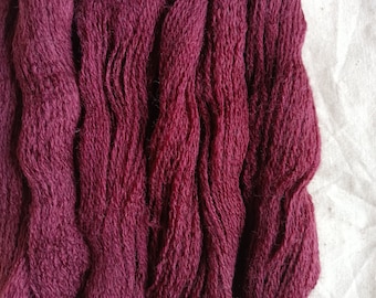 Extra fine Merino wool sangria burgundy reclaimed, recycled yarn in lace, 2 ply weight. Zero-waste