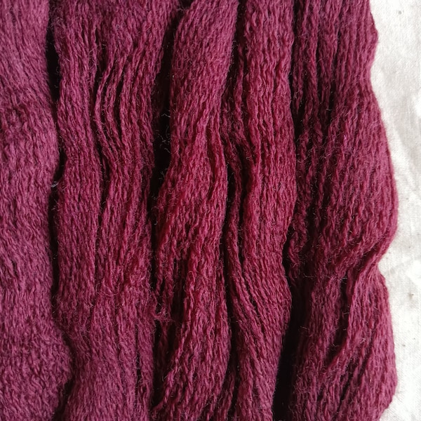 Extra fine Merino wool sangria burgundy reclaimed, recycled yarn in lace, 2 ply weight. Zero-waste