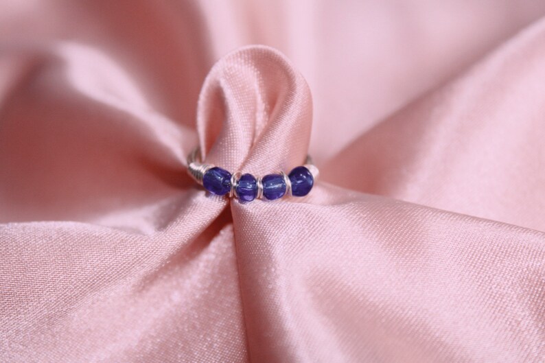 blue 4 bead ring