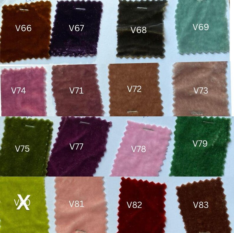 May include: A collection of velvet fabric swatches in various colors, including brown, purple, green, and pink. Each swatch is labeled with a white tag, such as V66, V67, and V68. The fabric has a soft, plush texture.
