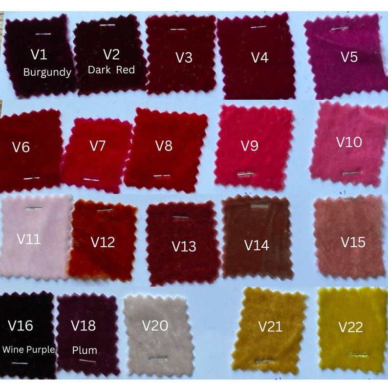 May include: A selection of 22 fabric swatches in a range of colours, including reds, pinks, and golds. Each swatch is labelled with a "V" number and a colour name, such as "Burgundy," "Dark Red," and "Wine Purple."