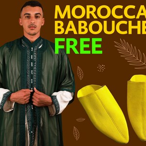 May include: A man wearing a green and white robe with intricate embroidery stands in front of a brown background. The text "MOROCCAN BABOUCHE FREE" is displayed in yellow and green letters. Two yellow leather babouche slippers are shown on the bottom right of the image.