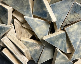 80-piece Lot of Small Triangle Beaver Falls, PA Victorian Fireplace Tiles - Mottled Light Blue =