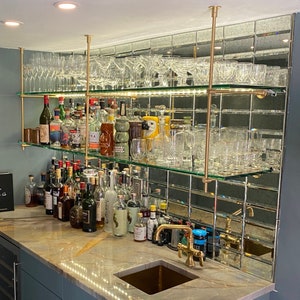 Customized bistro bar. (Up to 50&#39;&#39; height - 70&#39;&#39; width - 15&#39;&#39; depth) Wall & ceiling mounted, unlacquered satin and solid brass bistro bar.