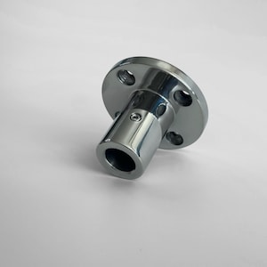 May include: A silver metal coupling with a round flange and a threaded shaft. The coupling is designed to connect two shafts together.