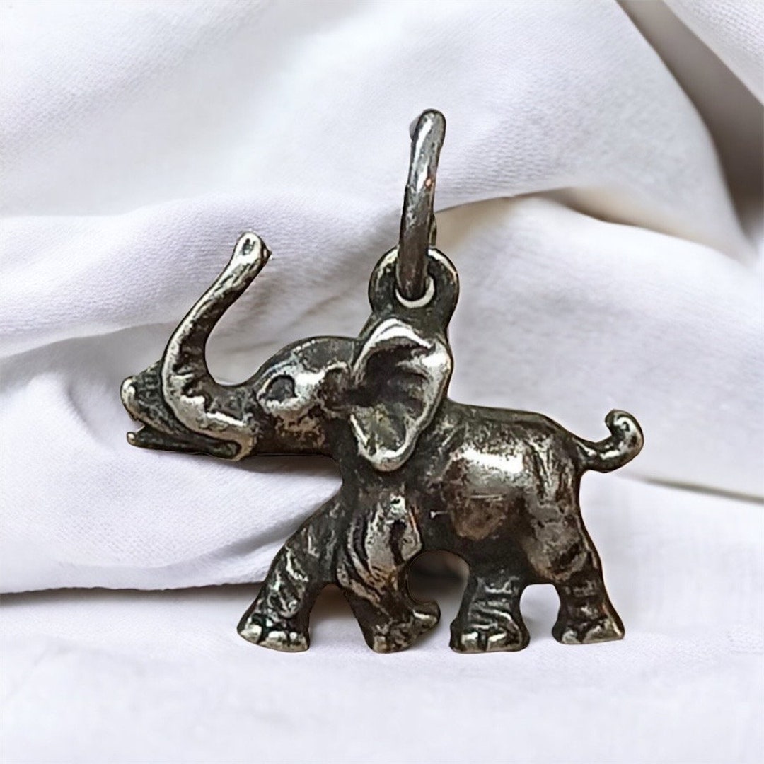 Pendentif éléphant Doré - Bijou Fantaisie Occasion - Thème Dauphin (erreur?)