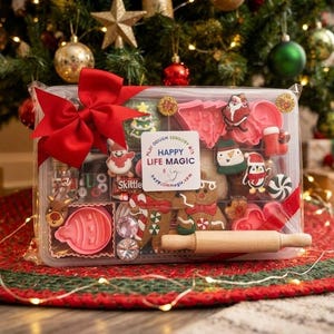 May include: A clear plastic storage container filled with Christmas-themed sensory play items, including cookie cutters, small figurines, and a wooden rolling pin. A large red bow is attached to the top, and a label reads HAPPY LIFE MAGIC.